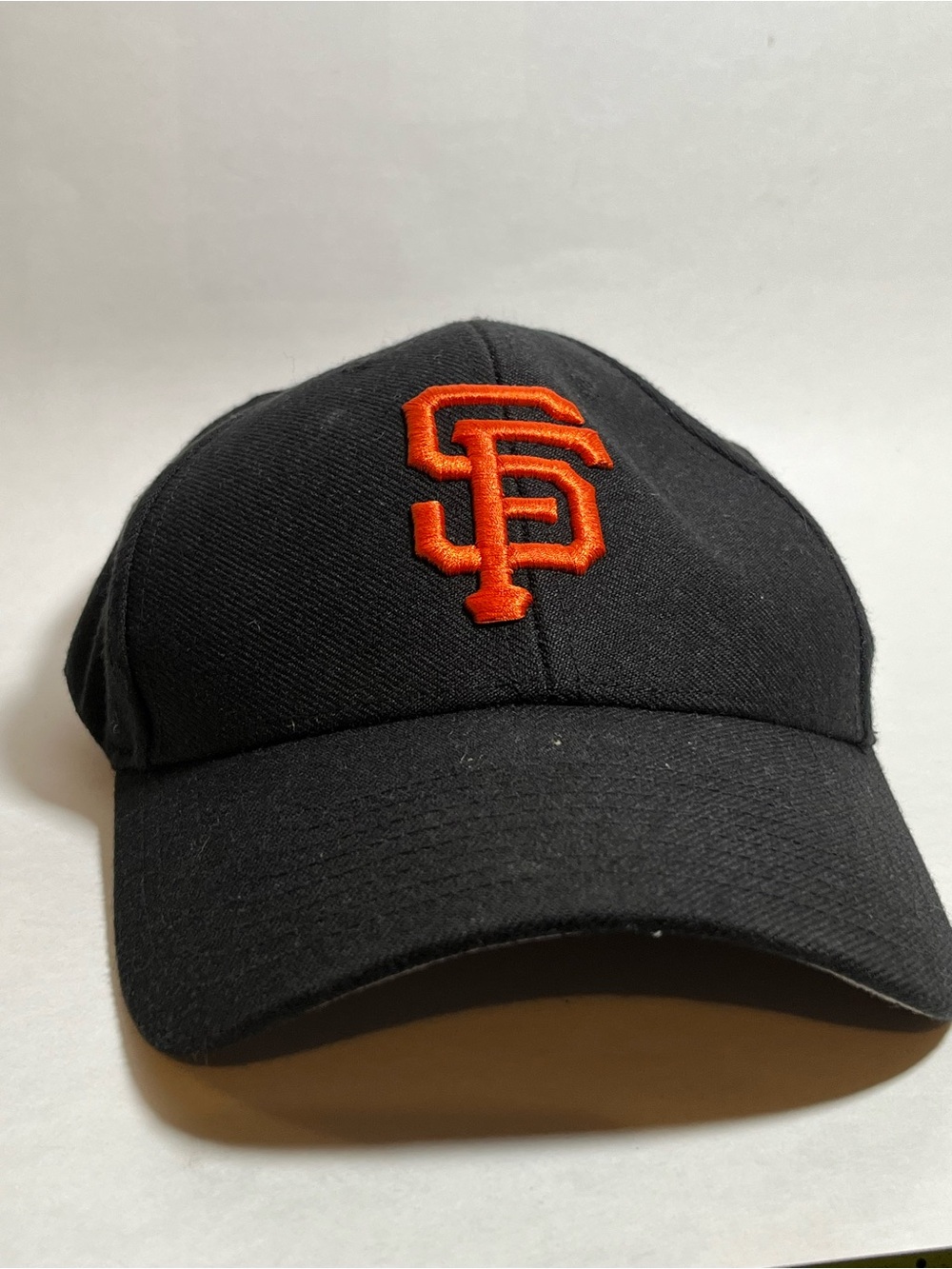 Genuine Merchandise Black Baseball Cap with Embroidered Label
